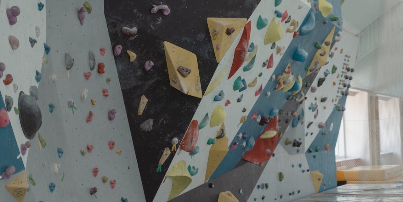 A child climbing an indoor wall