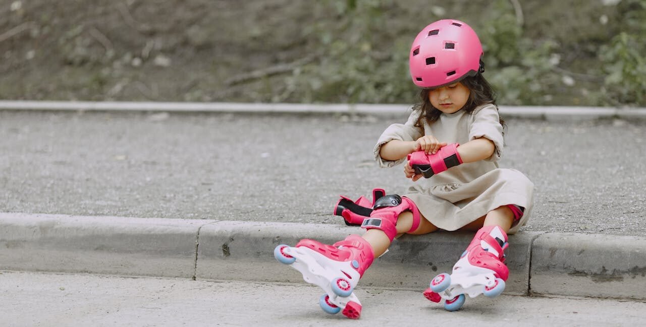 A child rollerblading outdoors