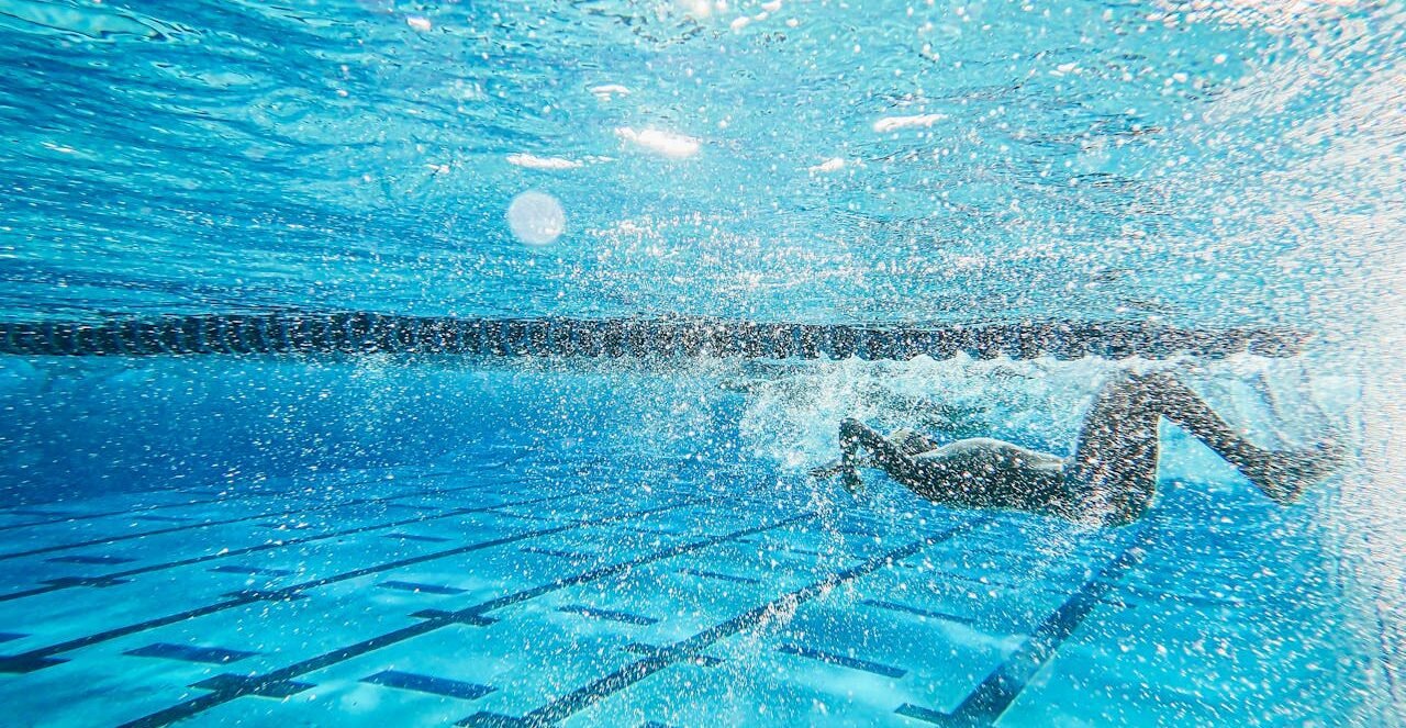 A child swimming in a pool